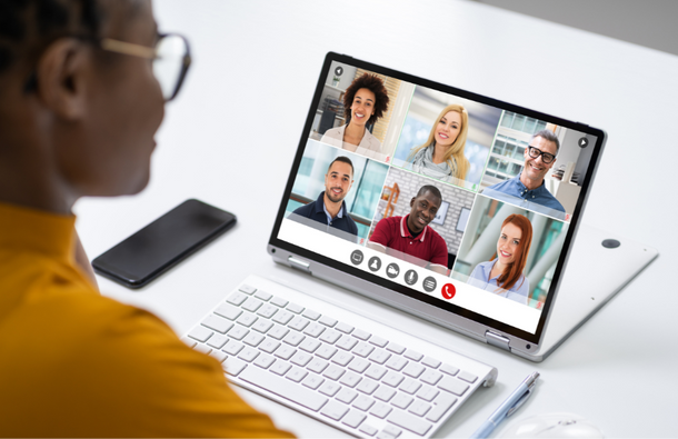 Woman watching screen of online event (2).png