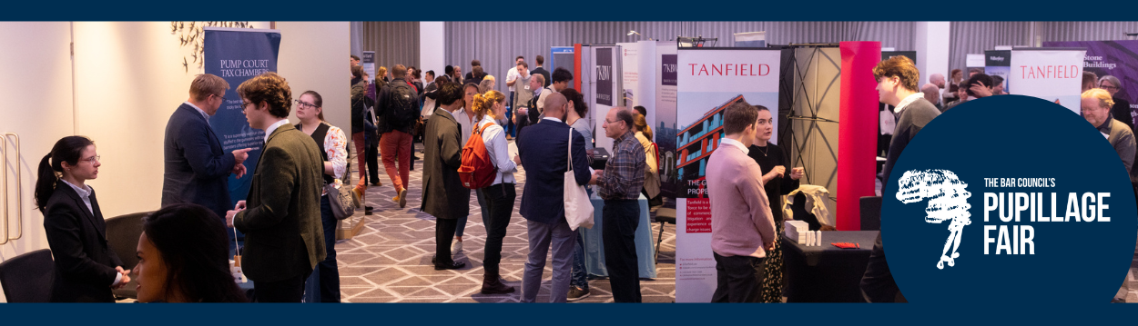 A photo of the exhibition area of the Pupillage Fair with many students in discussion with chambers and other exhibitors